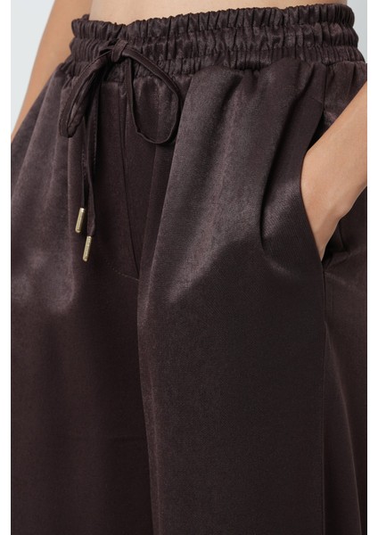 Kadın Düz Renk Bağcık Detaylı Bol Paça Beli Lastikli Pantolon fırsatları