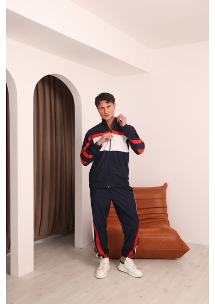 Erkek Lacivert Özel Seri Kırmızı ve Beyaz Şerit Detaylı Eşofman Takımı modelleri