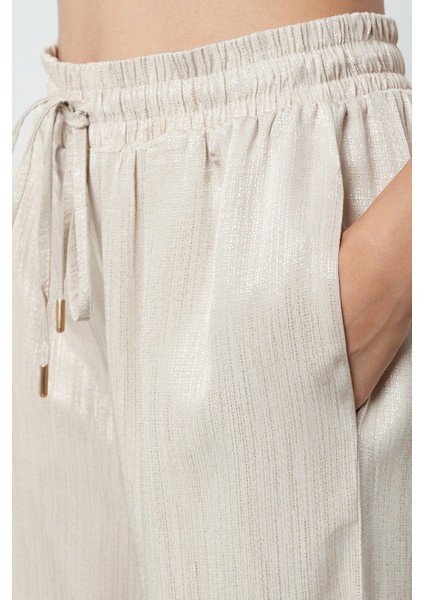 Kadın Bej Renk Ince Desenli Bol Paça Beli Lastikli Pantolon fırsatları