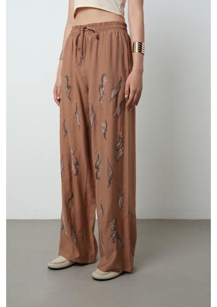 Kadın Önü Taş Işlemeli Düz Renk Beli Lastikli Bol Paça Pantolon fiyatları