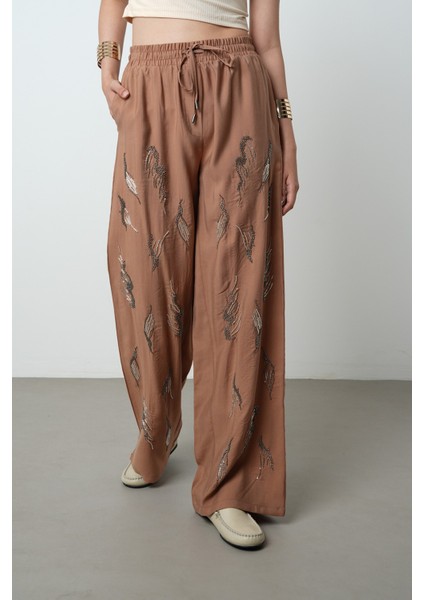 Kadın Önü Taş Işlemeli Düz Renk Beli Lastikli Bol Paça Pantolon modelleri