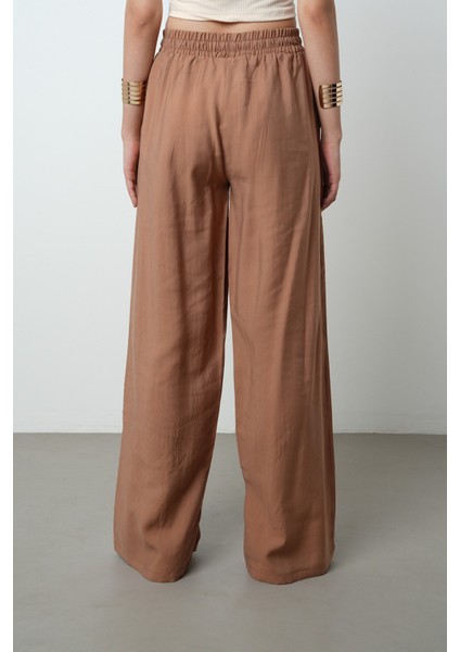 Kadın Önü Taş Işlemeli Düz Renk Beli Lastikli Bol Paça Pantolon indirimleri