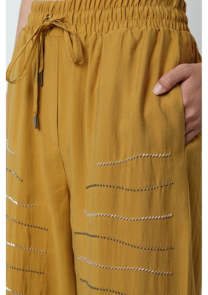 Kadın Yatay Şerit Taş Işlemeli Düz Renk Beli Lastikli Bol Paça Pantolon fırsatları