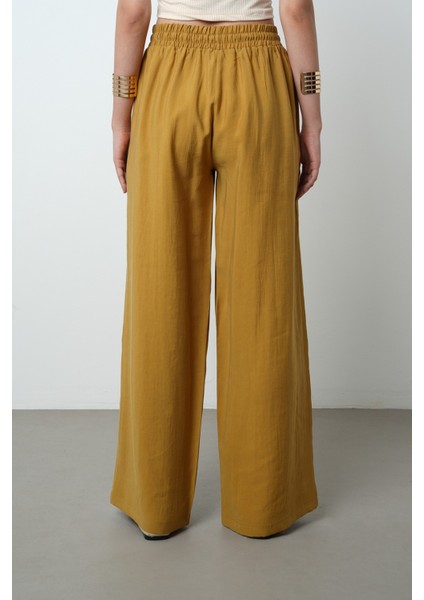 Kadın Yatay Şerit Taş Işlemeli Düz Renk Beli Lastikli Bol Paça Pantolon indirimleri