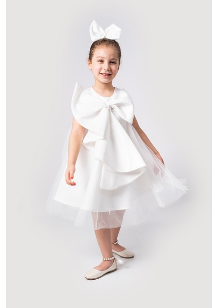 Kız Çocuk Abiye Elbise Büyük Fiyonk Detaylı Özel Gün Parti Elbisesi modelleri