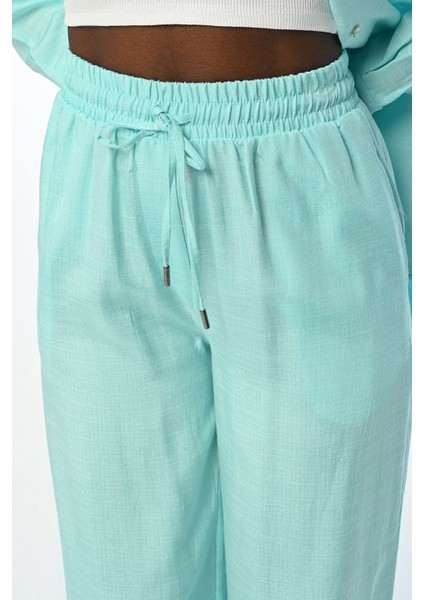 Kadın Beli Lastikli Bol Paça Düz Renk Pantolon fiyatları