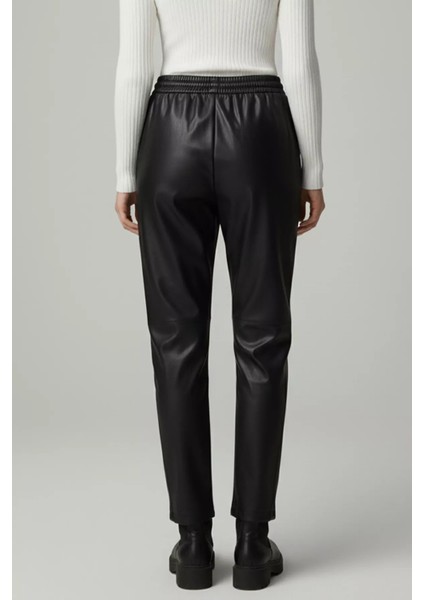 Kadın Büyük Beden Bel Lastikli Içi Şardonlu Suni Deri Pantolon P-00018870 fiyatları