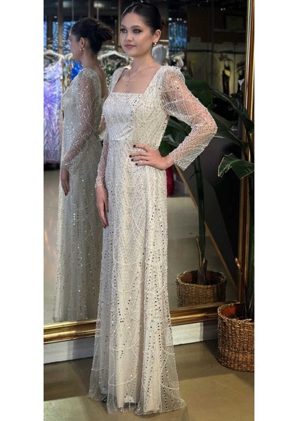 Bej Kare Yaka Uzun Kollu Kloş Etekli Pullu Boncuklu Uzun Abiye Elbise 11047-02 fiyatları