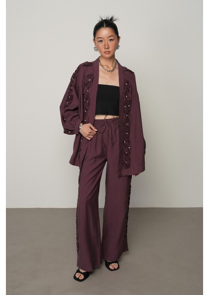 Kadın Şerit Gül ve Taş Detaylı Düz Renk Beli Lastikli Bol Paça Pantolon fırsatları