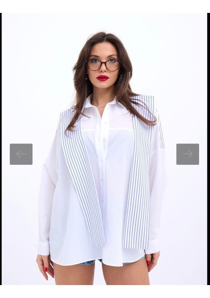 Gömlek Washington Çizgi sırt kısmında beyaz üstüne mavi çizgili ve önden biraz daha uzun omuzdan uzanan ayrı bir hava katan atkı detayı mevcut salaş bir model.. fiyatları