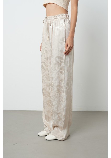 Kadın Bej Renk Çiçek Desenli Bol Paça Beli Lastikli Pantolon fiyatları