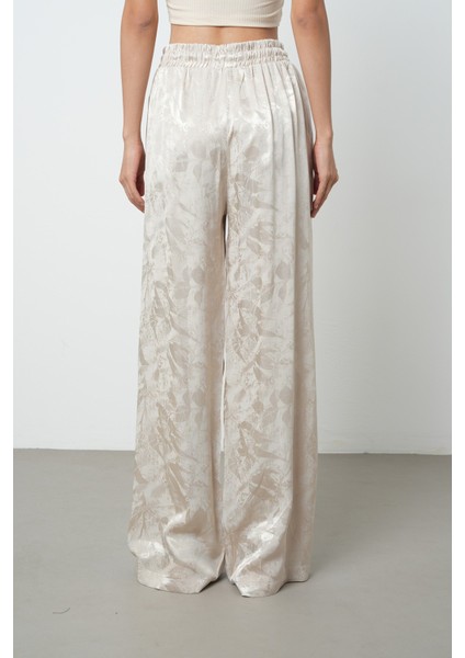 Kadın Bej Renk Çiçek Desenli Bol Paça Beli Lastikli Pantolon fırsatları