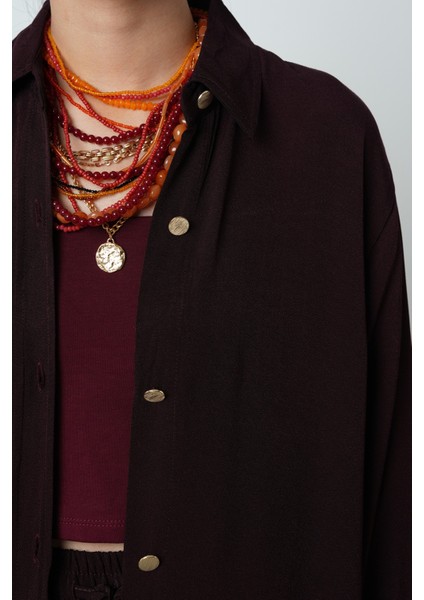 Kadın Düz Renk Altın Düğme Detaylı Oversize Kesim Gömlek modelleri