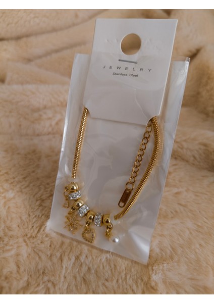 Charmlı Çelik Yıldız Detaylı Gold Bileklik fırsatları