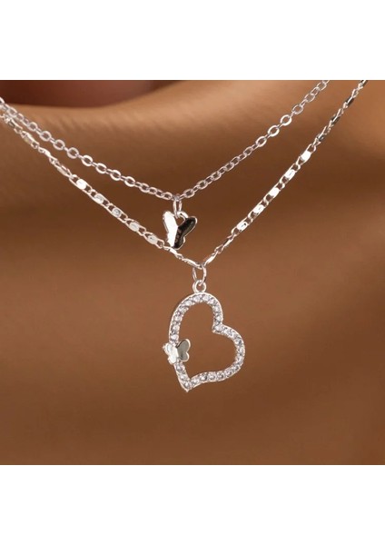 Kadın Kolye – Gümüş Kaplama Çift Katmanlı Kelebek ve Kalp Figürlü, Zirkon Taşlı Çelik Tasarım fiyatları