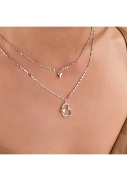 Kadın Kolye – Gümüş Kaplama Çift Katmanlı Kelebek ve Kalp Figürlü, Zirkon Taşlı Çelik Tasarım modelleri