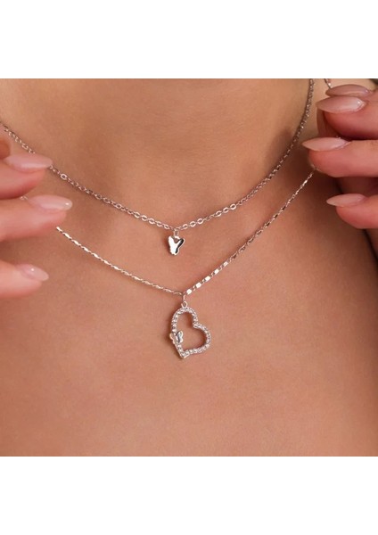 Kadın Kolye – Gümüş Kaplama Çift Katmanlı Kelebek ve Kalp Figürlü, Zirkon Taşlı Çelik Tasarım fırsatları