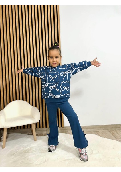 Kız Çocuk Pamuklu Lacivert Fiyonk Desenli Sweatshirt ve Volan Paça Eşofman Takımı fiyatları