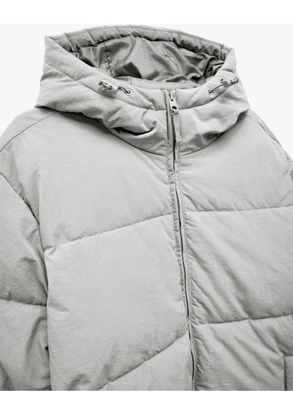 Uzun Kollu Cep Detaylı Fermuarlı Kapşonlu Kışlık Şişme Mont indirimleri