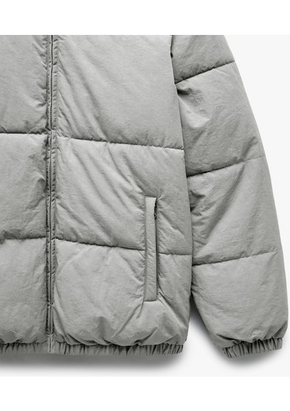 Uzun Kollu Cep Detaylı Fermuarlı Kapşonlu Kışlık Şişme Mont