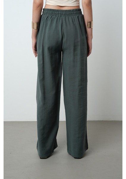 Kadın Yatay Şerit Taş Işlemeli Düz Renk Beli Lastikli Bol Paça Pantolon indirimleri