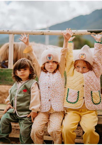 Lale Desenli Peluş Krem Yelek indirimleri