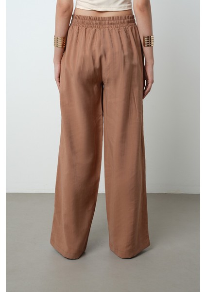 Kadın Yatay Şerit Taş Işlemeli Düz Renk Beli Lastikli Bol Paça Pantolon indirimleri