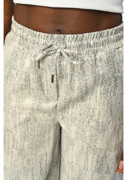 Kadın Bol Paça Beli Lastikli Beyaz-Laci Pantolon fiyatları