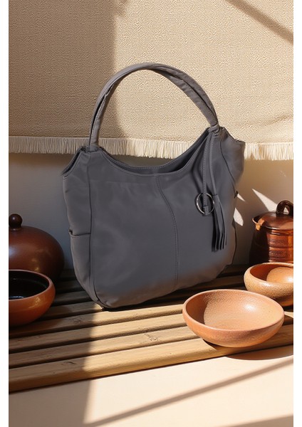 Astarlı Tek Bölmeli Püsküllü El ve Omuz Çantası 111005 modelleri