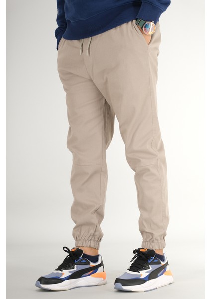 Erkek Taş Rengi Jogger Pantolon Rahat Kesim Pamuklu Lastikli Paça Ipli modelleri