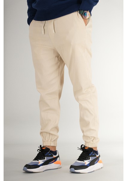 Erkek Bej Jogger Pantolon Rahat Kesim Pamuklu Lastikli Paça Ipli modelleri