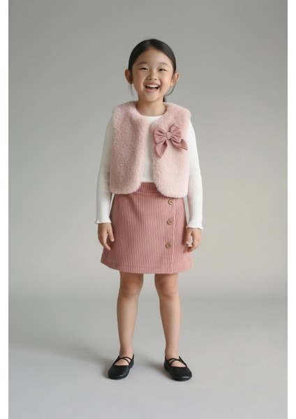 Kız Çocuk Pamuklu Pembe Fiyonklu 3'lü Kürklü Yelekli Etekli Takım – Zarif Günlük Kombin