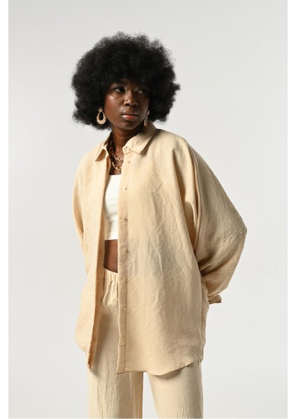 Kadın Kolları Bağlama Detaylı Kırışık Kumaş Düz Renk Oversize Gömlek fiyatları