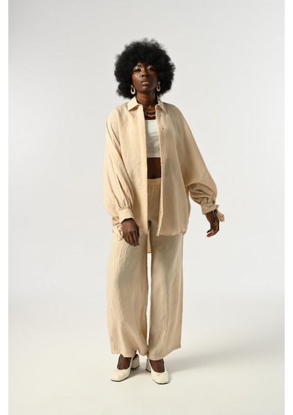 Kadın Kolları Bağlama Detaylı Kırışık Kumaş Düz Renk Oversize Gömlek fırsatları