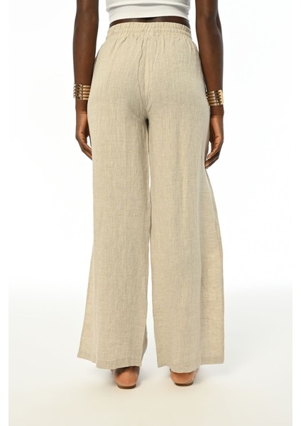 Kadın Rahat Kalıp Bol Paça Beli Lastikli Taş Işlemeli Natur Pantolon fiyatları