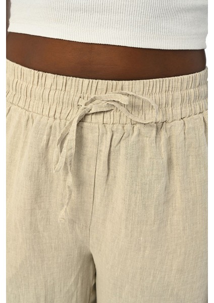 Kadın Rahat Kalıp Bol Paça Beli Lastikli Taş Işlemeli Natur Pantolon modelleri