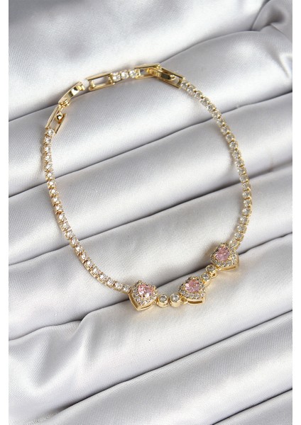 Pirinç Sıralı Pembe Kalp Figürlü Zirkon Taşlı Gold Renk Kadın Bileklik