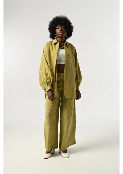 Kadın Kolları Bağlama Detaylı Kırışık Kumaş Düz Renk Oversize Gömlek fırsatları