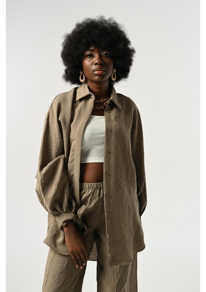 Kadın Kolları Bağlama Detaylı Kırışık Kumaş Düz Renk Oversize Gömlek fiyatları