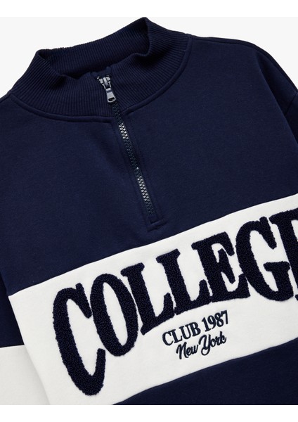 Uzun Kollu Yarım Fermuarlı Dik Yaka Nakışlı Oversize Sweatshirt modelleri