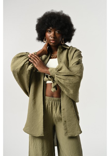 Kadın Kolları Bağlama Detaylı Kırışık Kumaş Düz Renk Oversize Gömlek modelleri