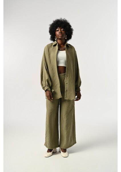 Kadın Kolları Bağlama Detaylı Kırışık Kumaş Düz Renk Oversize Gömlek fırsatları