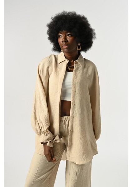 Kadın Kolları Bağlama Detaylı Kırışık Kumaş Düz Renk Oversize Gömlek fiyatları