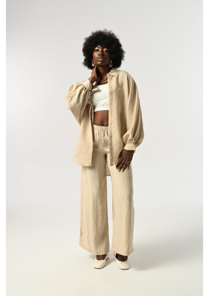 Kadın Kolları Bağlama Detaylı Kırışık Kumaş Düz Renk Oversize Gömlek fırsatları