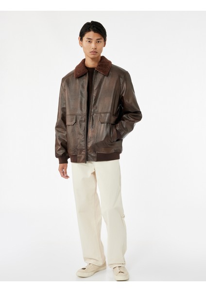 Uzun Kollu Cep Detaylı Slim Fit Fermuarlı Peluş Yaka Kışlık Suni Deri Ceket