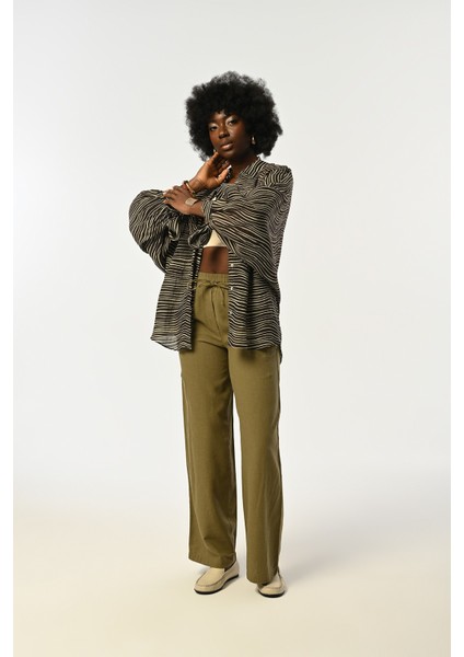 Kadın Kolları Bağlamalı Desenli Oversize Kesim Gömlek fırsatları