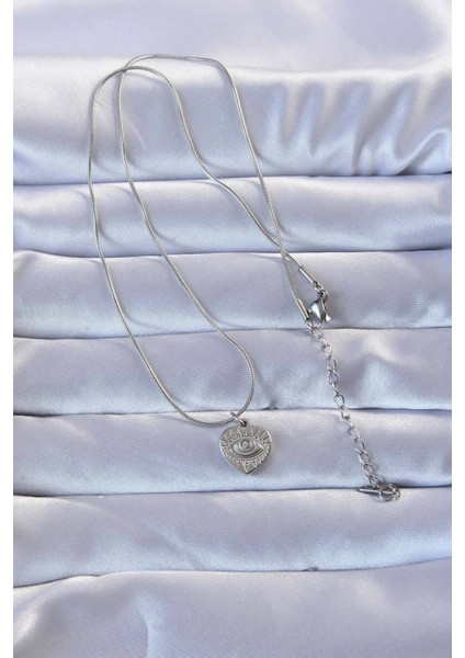 316L Gümüş Renk Zirkon Taşlı İşlemeli Göz Detay Kalp Kolye fiyatları