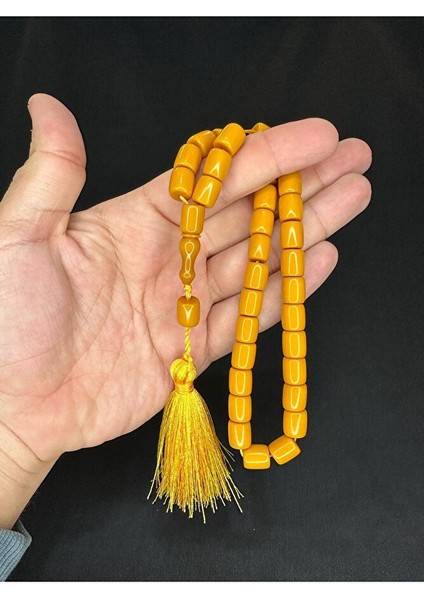 SIKMA KEHRİBAR TESBİH KOYU SARI RENKLİ KAPSÜL KESİM 10,5MMX9MM T-610 indirimleri