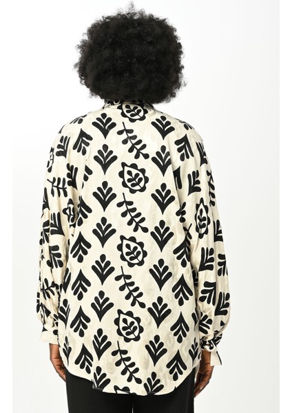 Kadın Karışık Desenli Siyah Beyaz Kolları Bağlamalı Oversize Kesim Gömlek indirimleri