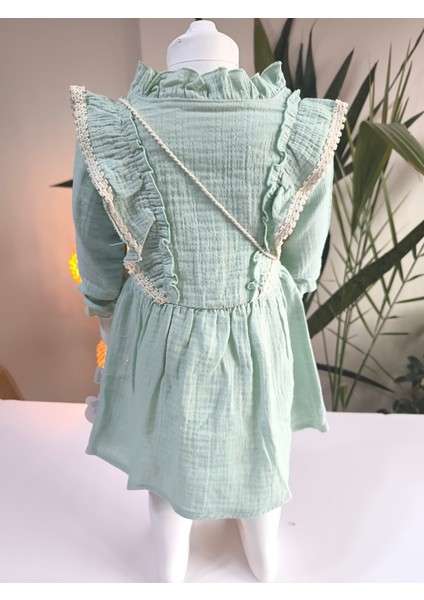 Uzun Kollu Dantel Detaylı Otantik Müslin Çantalı Kız Çocuk Elbisesi fırsatları